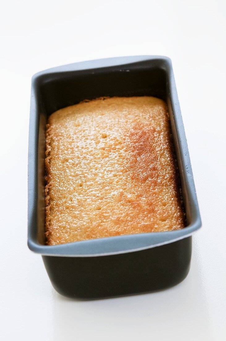 Home-made apple cake in a loaf tin