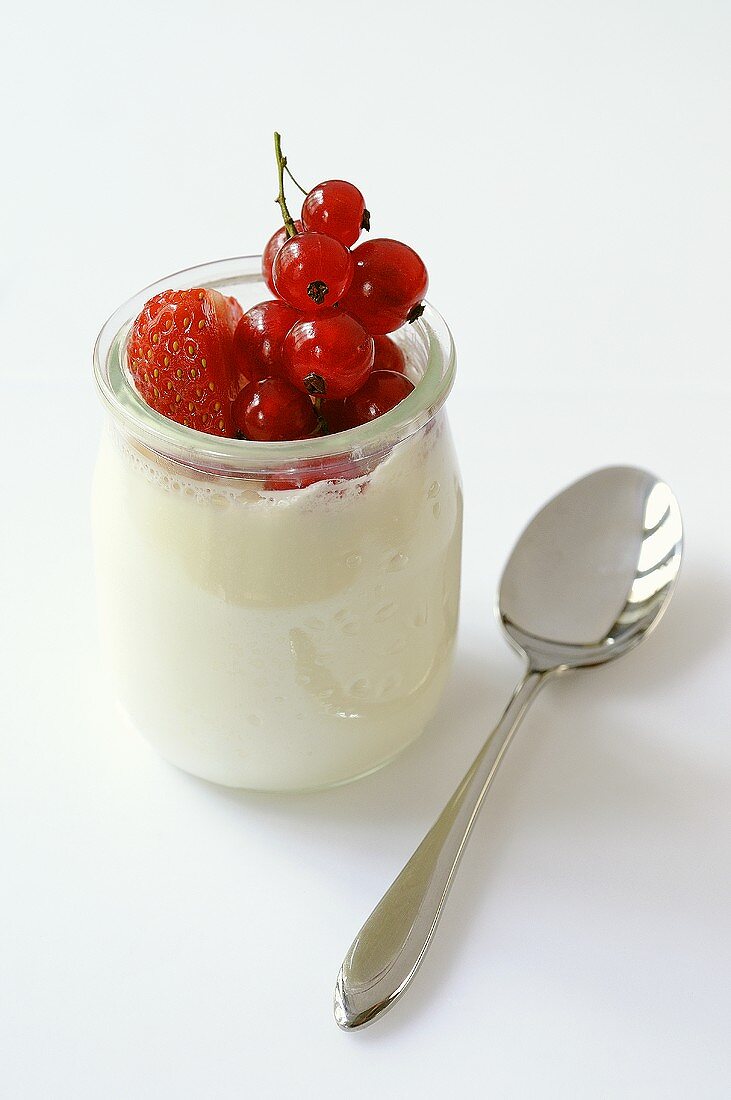 Natural yoghurt with strawberries and redcurrants