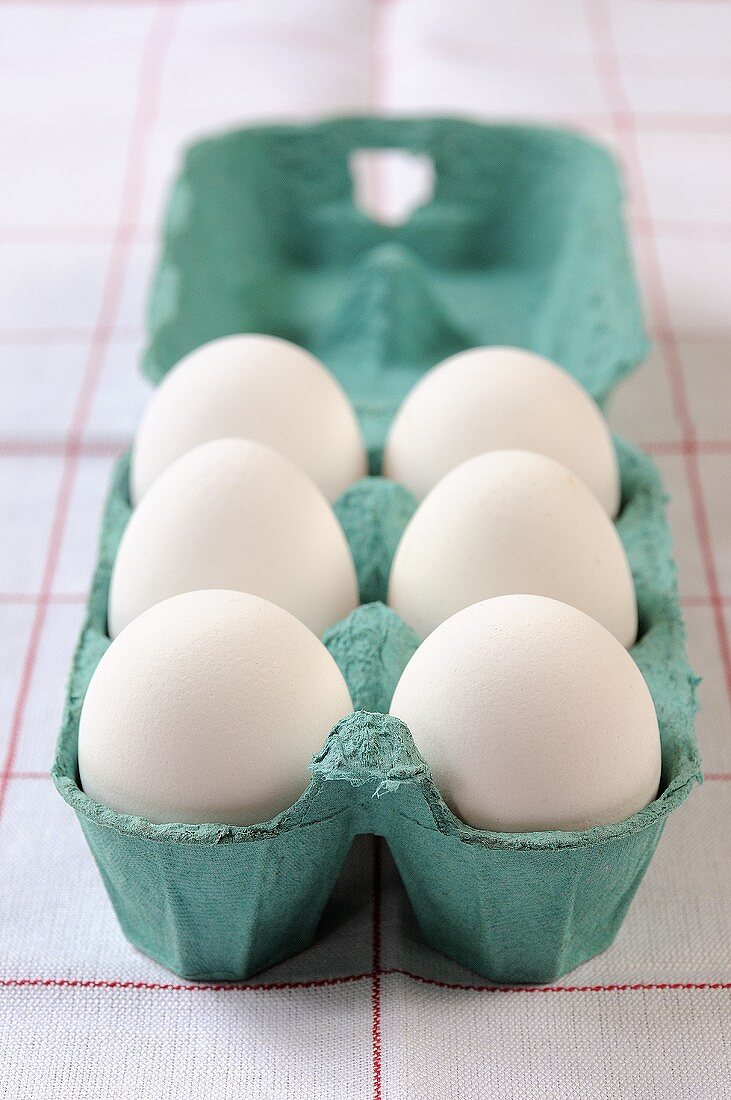 White eggs in an egg box