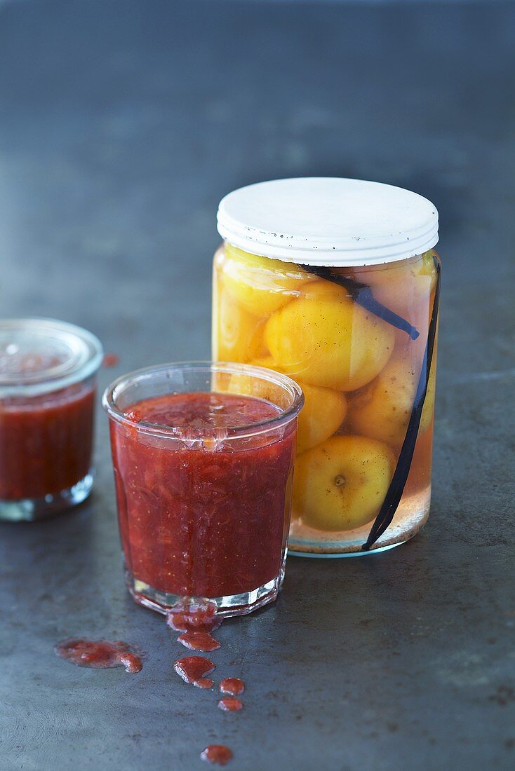 Strawberry and rhubarb jam and bottled peaches