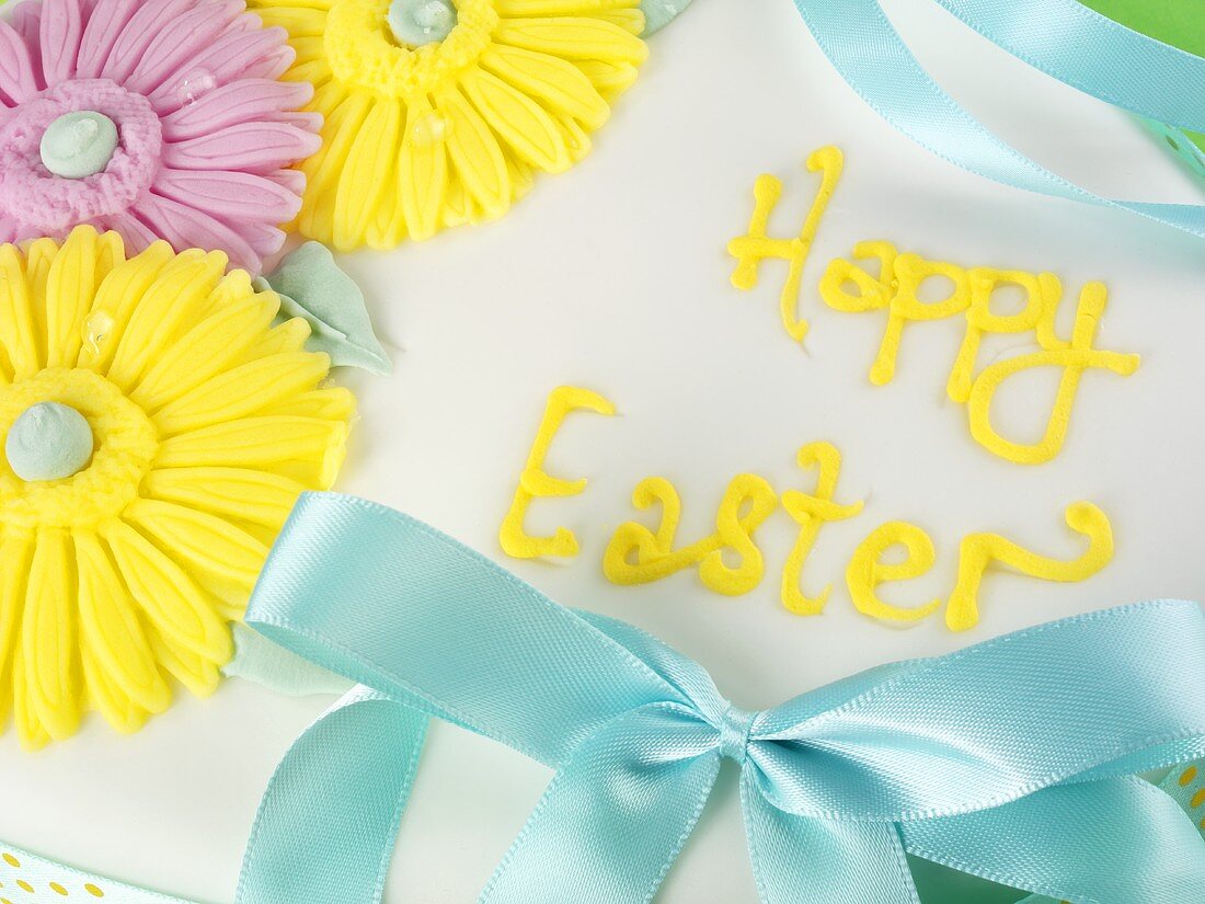 Easter cake with flower decoration and bow