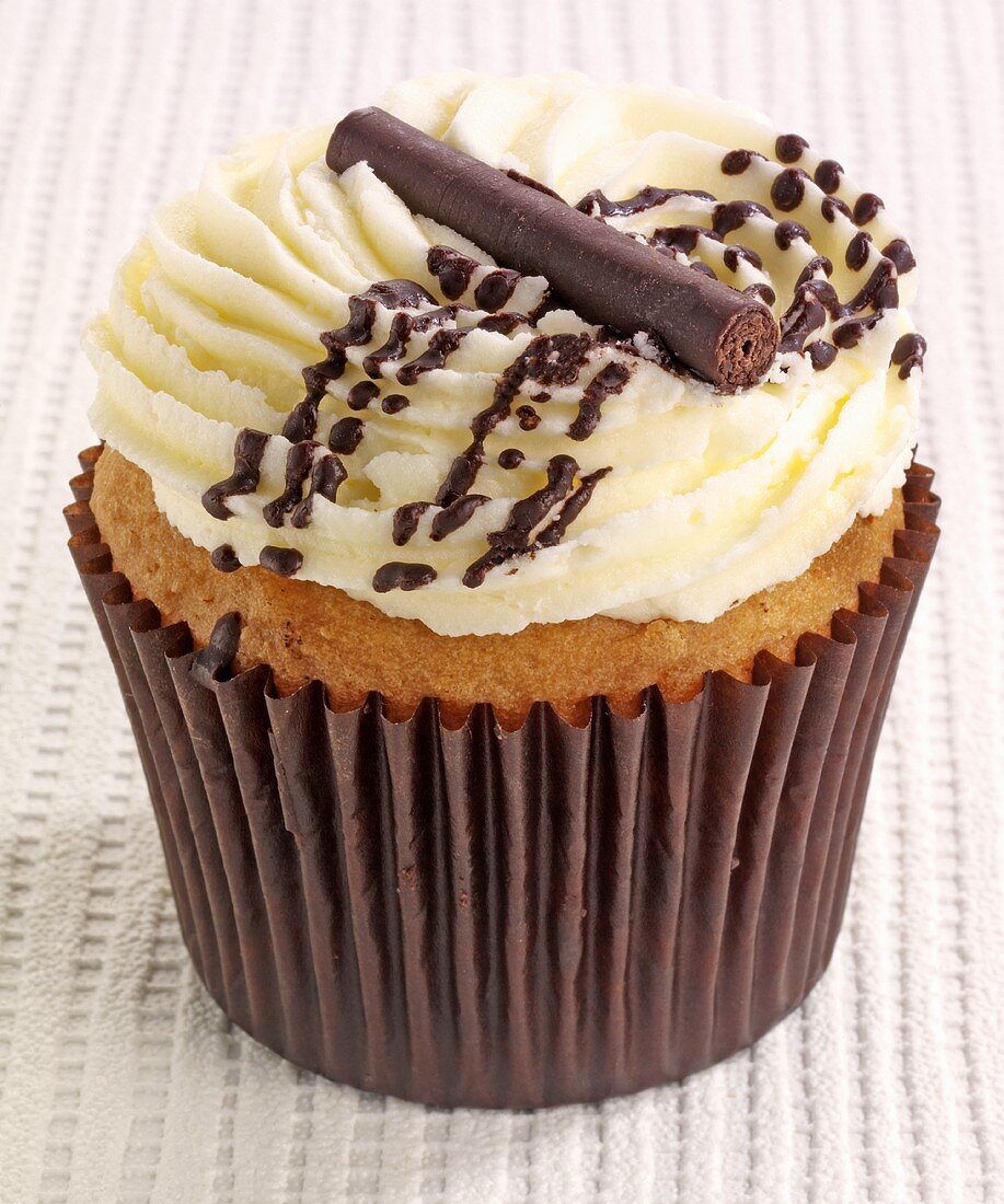 A chocolate cupcake with butter cream