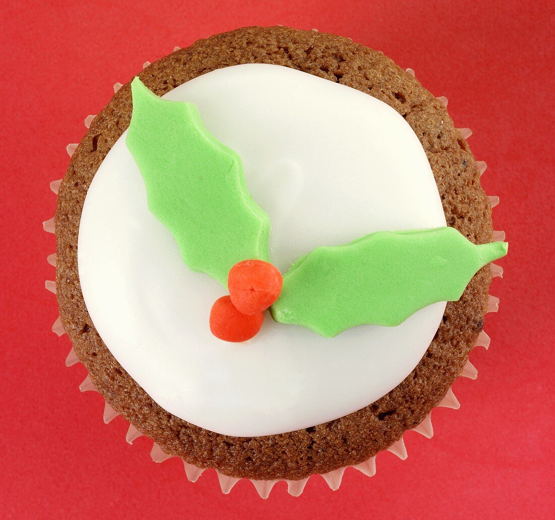 Chocolate cupcake with holly leaf decoration