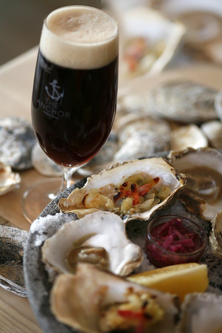 Grilled oysters with dark beer