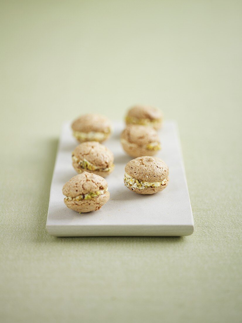 Six macaroons with pistachio cream filling
