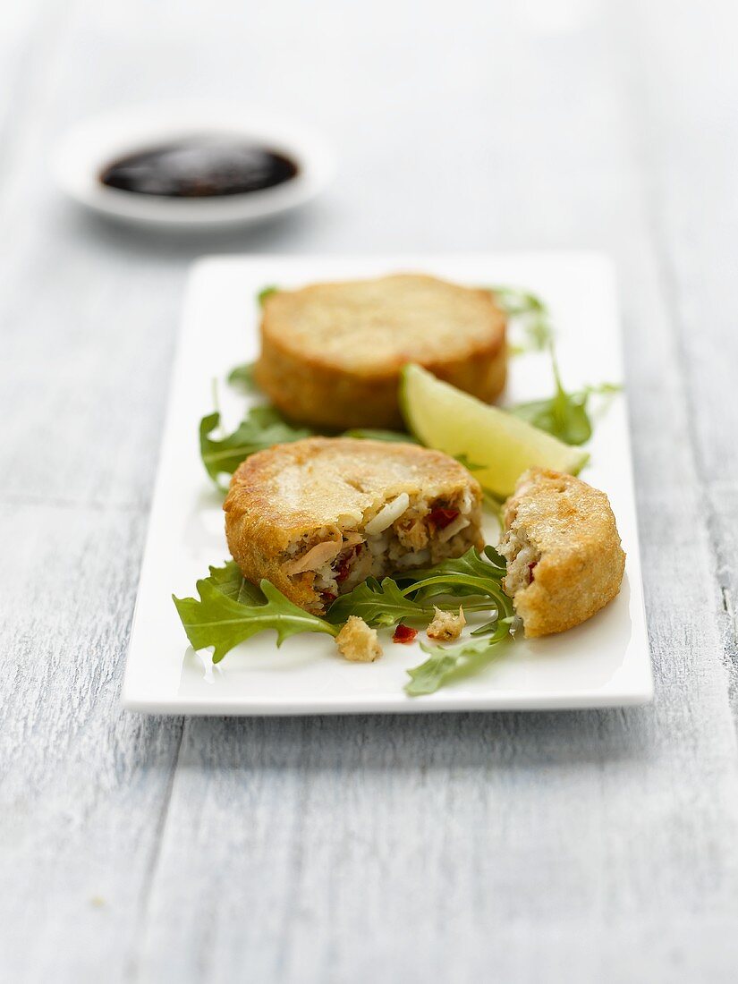 Filled fish cakes on rocket