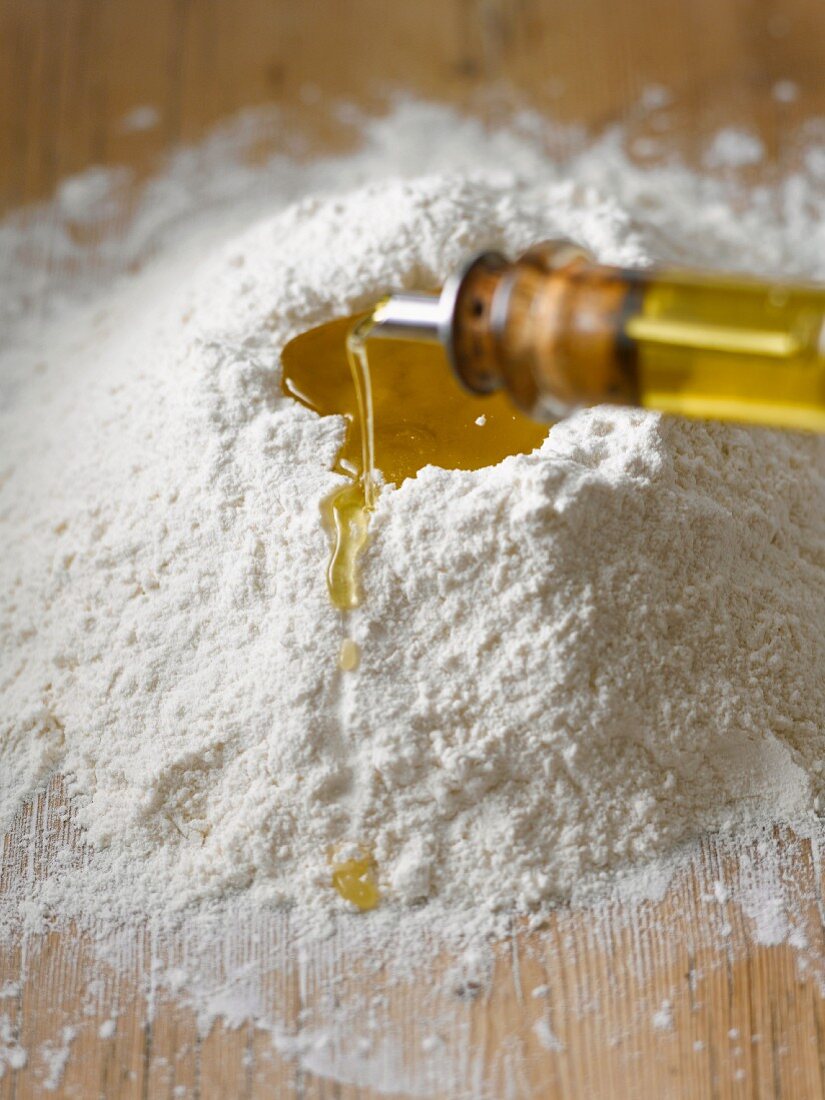 Adding olive oil to flour