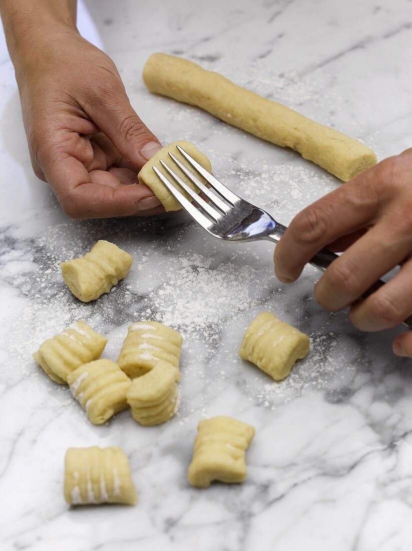 Shaping gnocchi with a fork