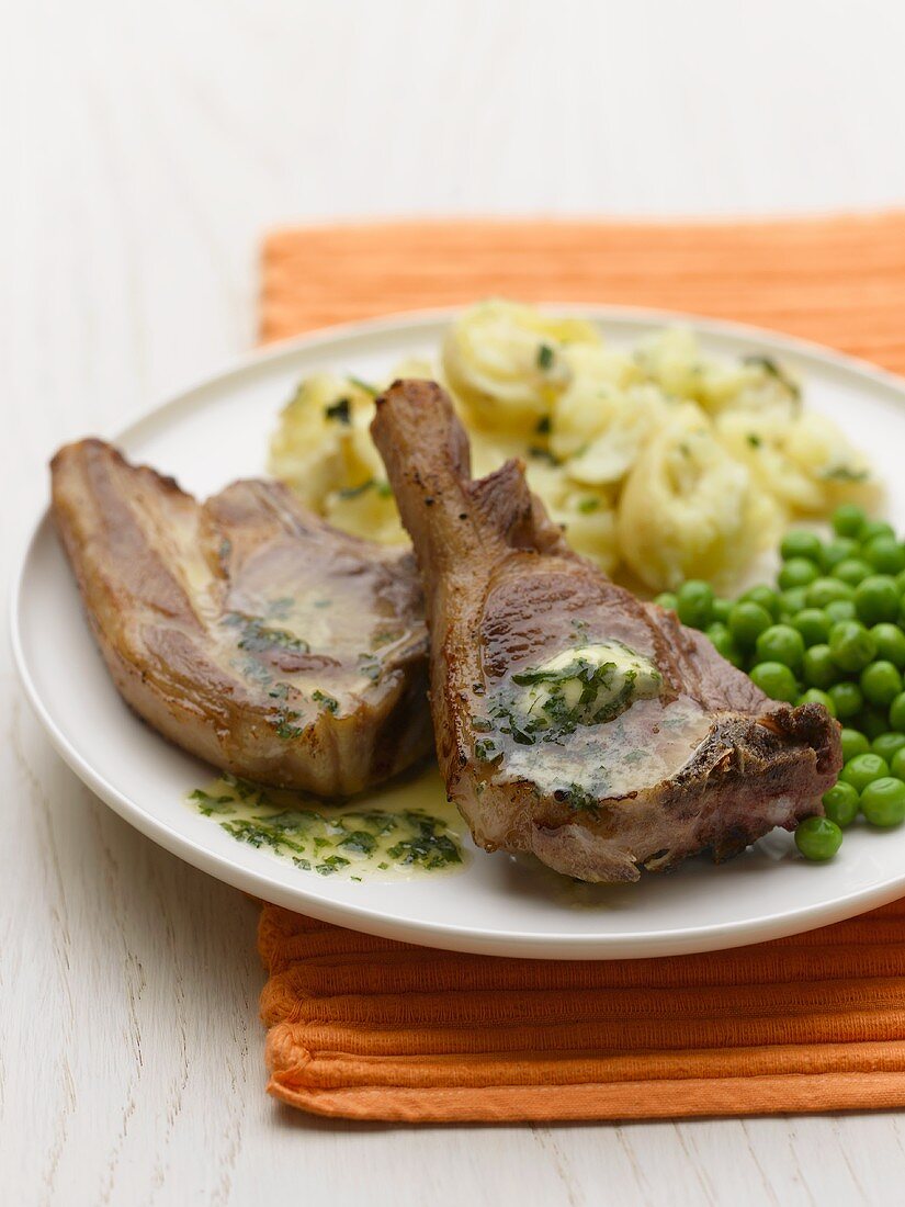 Lamb chops with mashed potato and peas