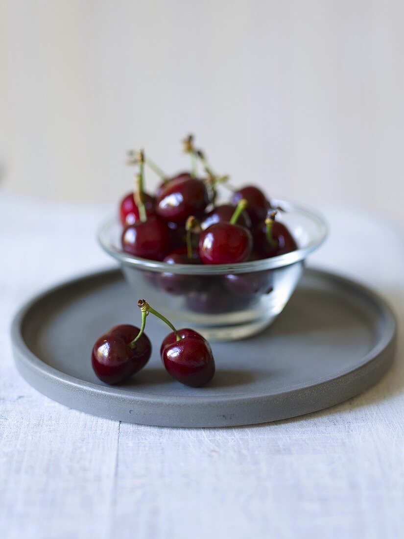 Cherries in a small glass bowl