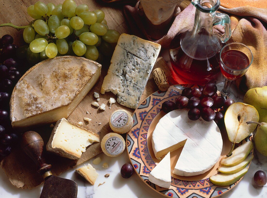 Assorted Cheese with Grapes and Wine