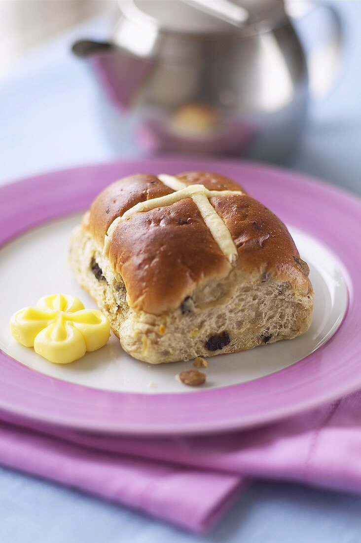 Hot cross bun with butter