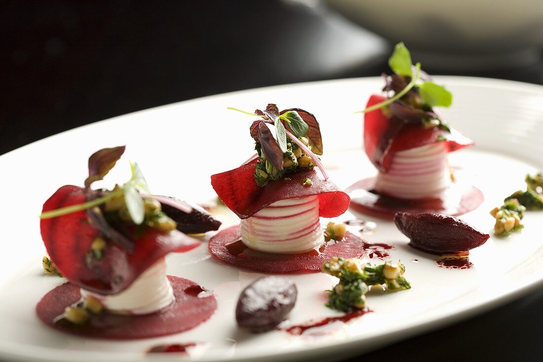 Marinated beetroot with cheese, pine nuts, red wine dressing