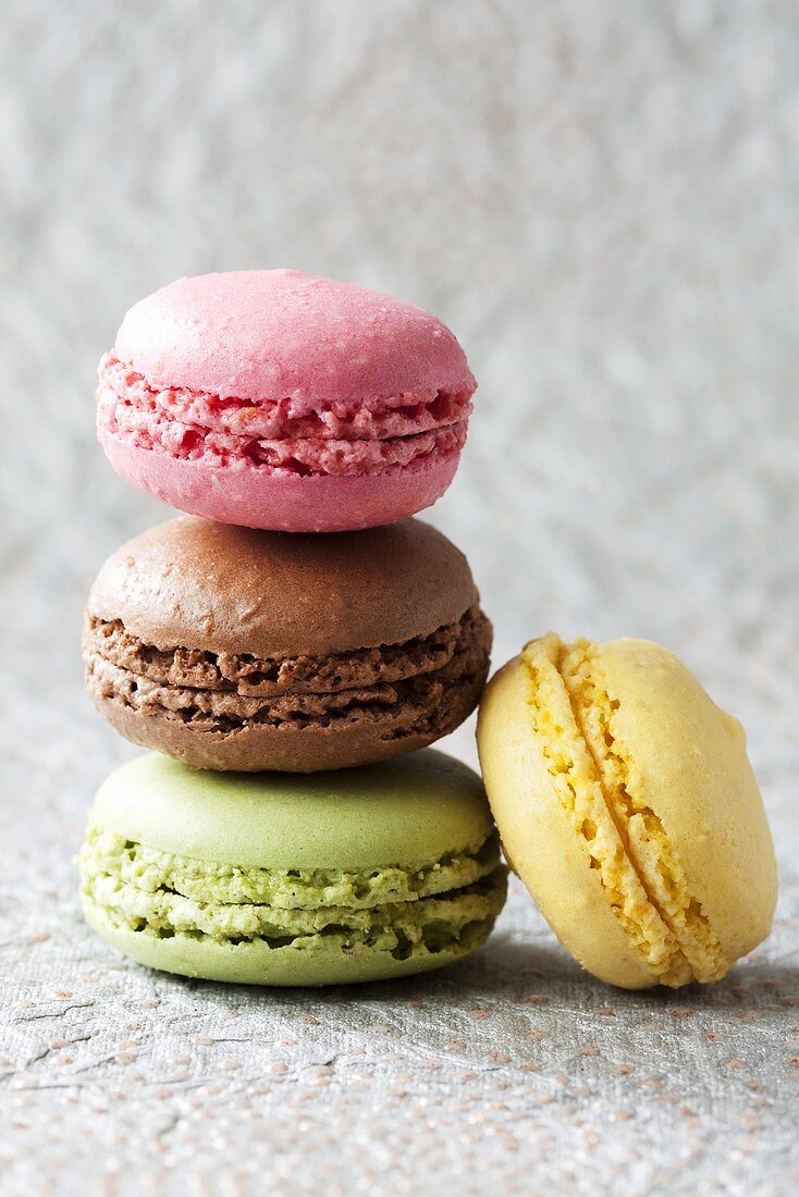 Four different coloured macarons