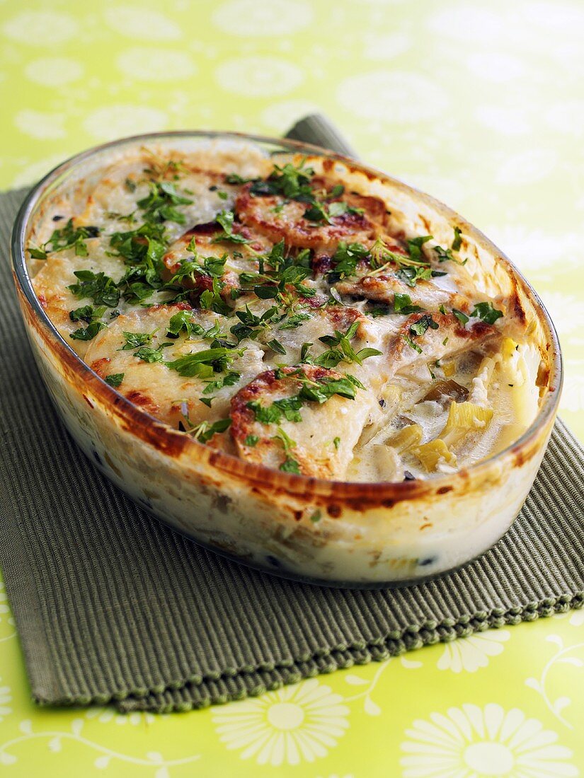 Potato gratin in glass baking dish