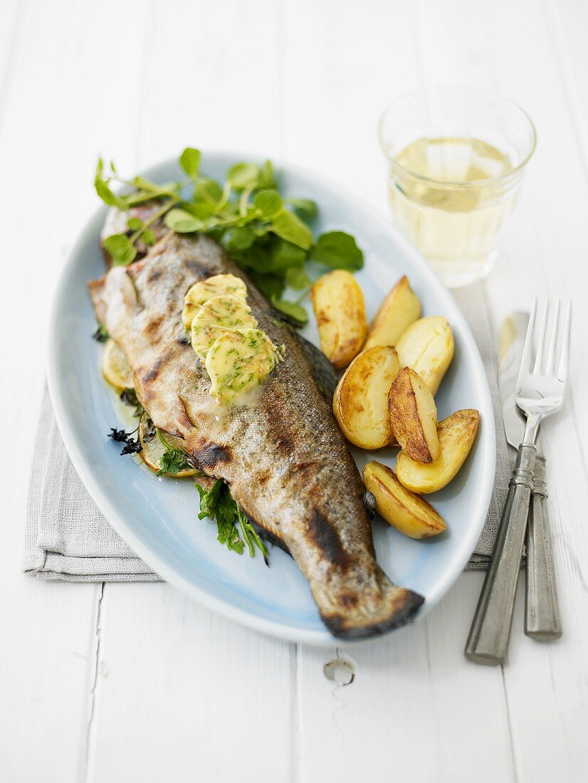 Roasted trout with lemon butter and roasted potatoes