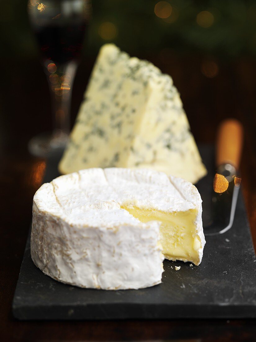Camembert and blue cheese on a board (Christmas)