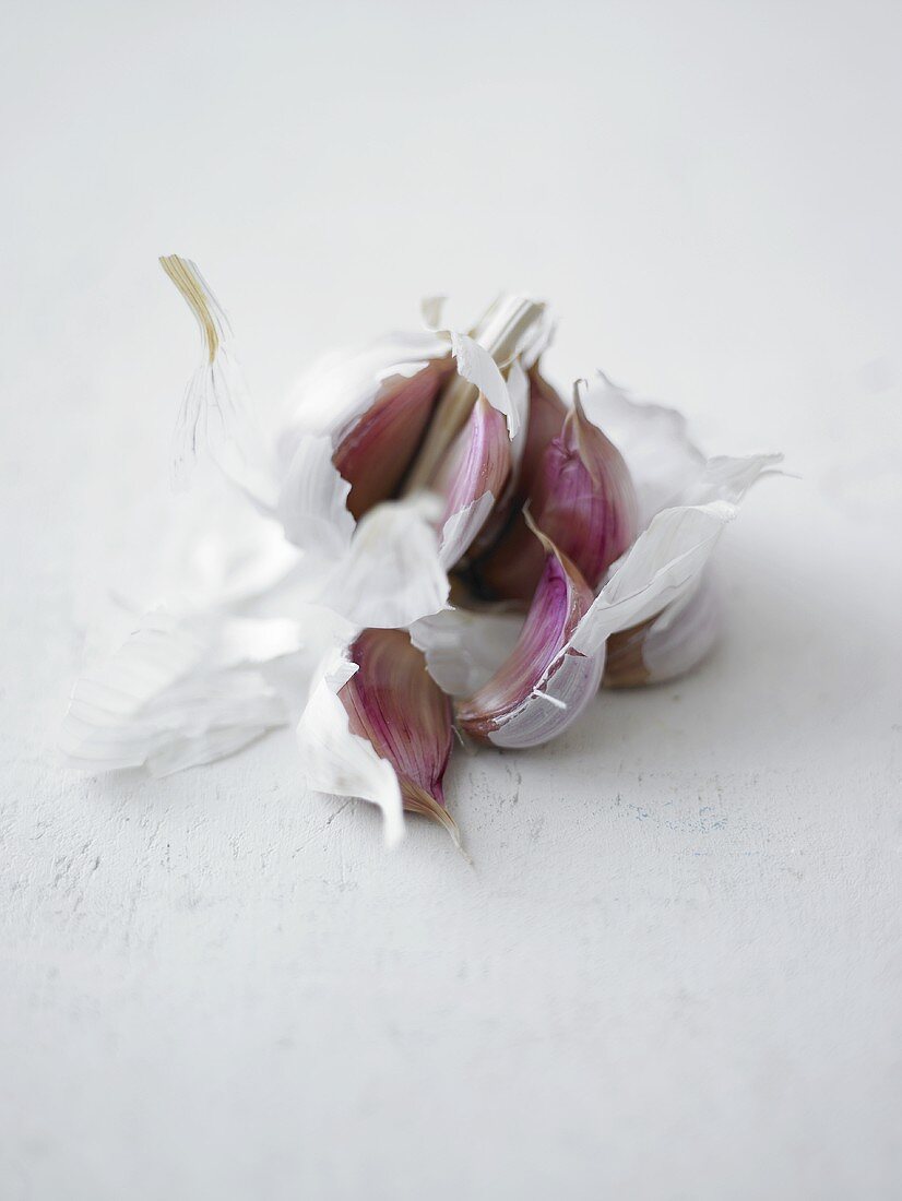 Open garlic bulb with cloves