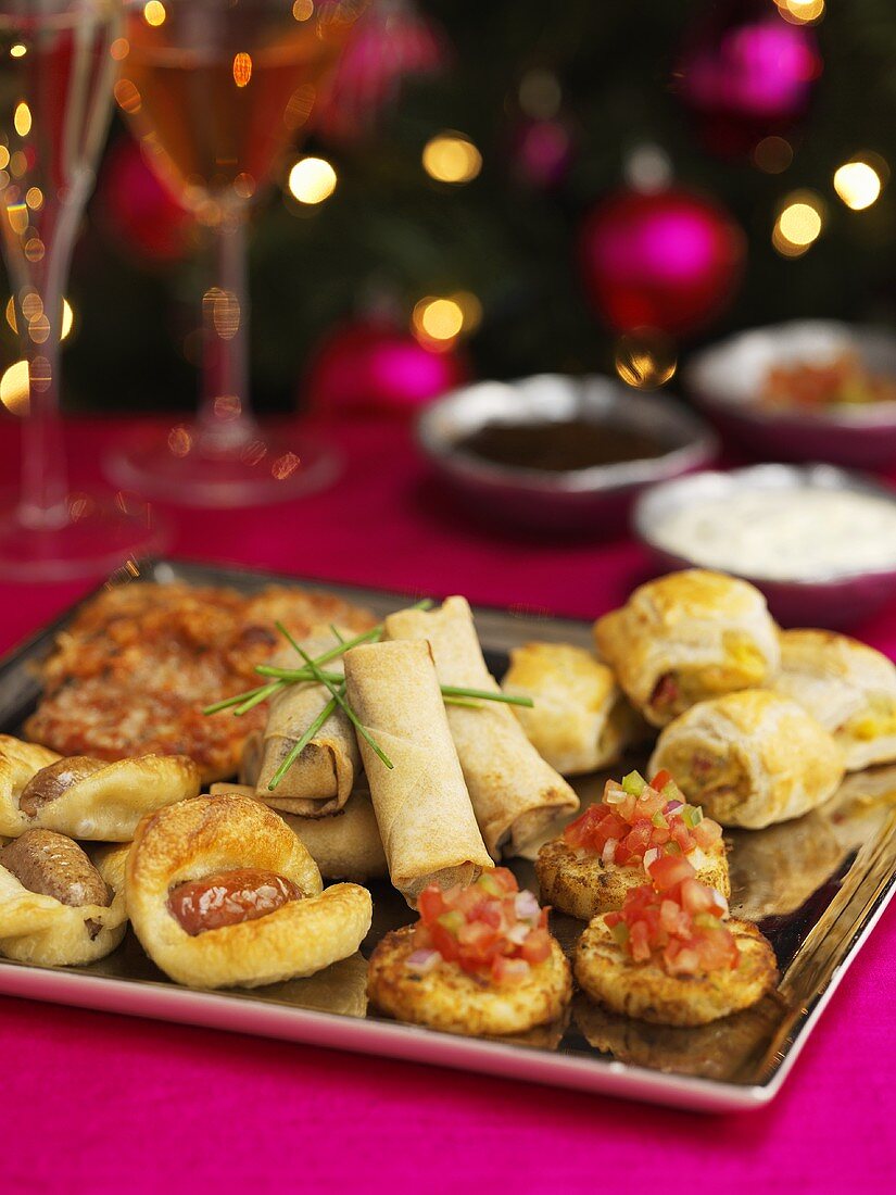 Christmas starter platter with appetizers, hors d`oevres