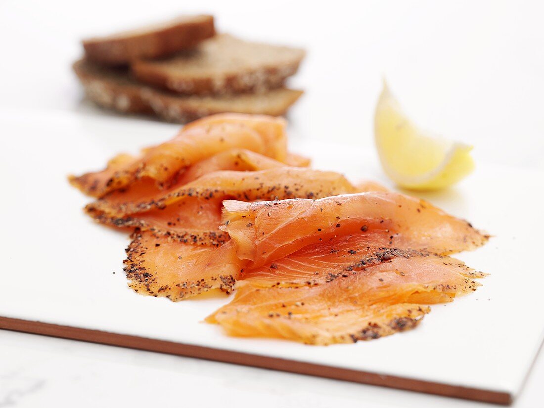 Scottish smoked salmon with lemon wedge