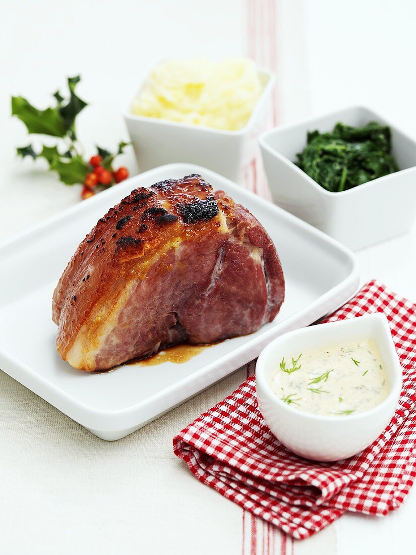 Roast ham with sauce and side dishes (Christmas)