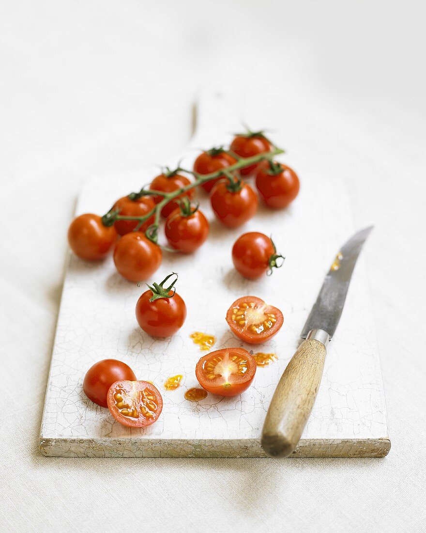 Cherry tomatoes on the vine and cut in half