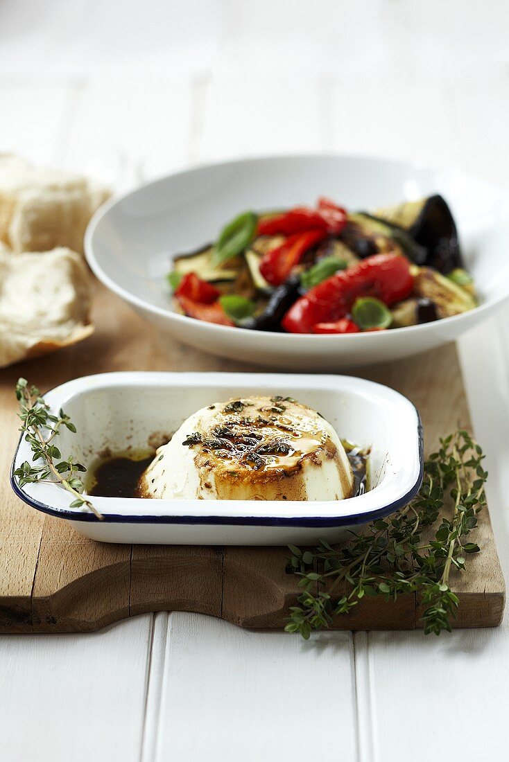 Baked ricotta with thyme dressing and vegetables