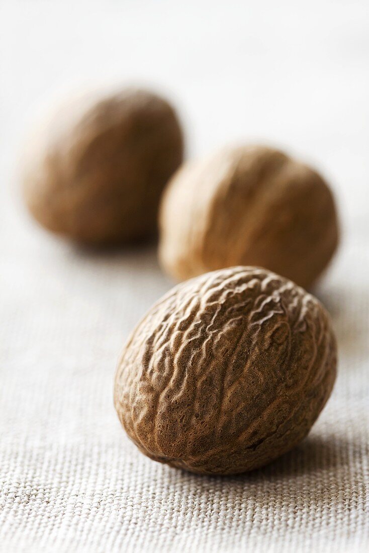 Three whole nutmegs
