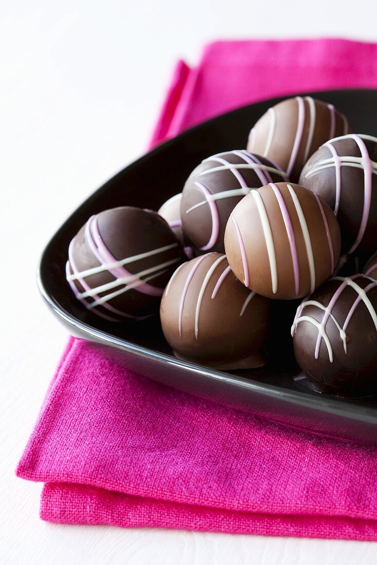 Several chocolates on plate