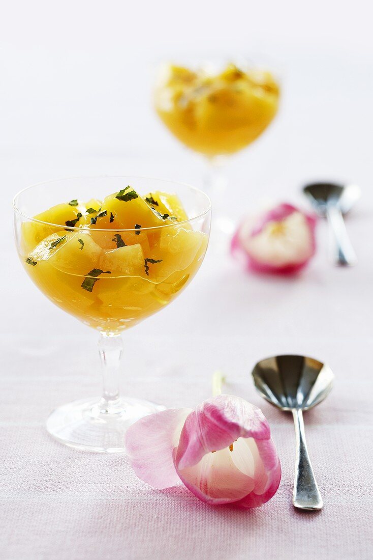 Orange jelly in two dessert glasses