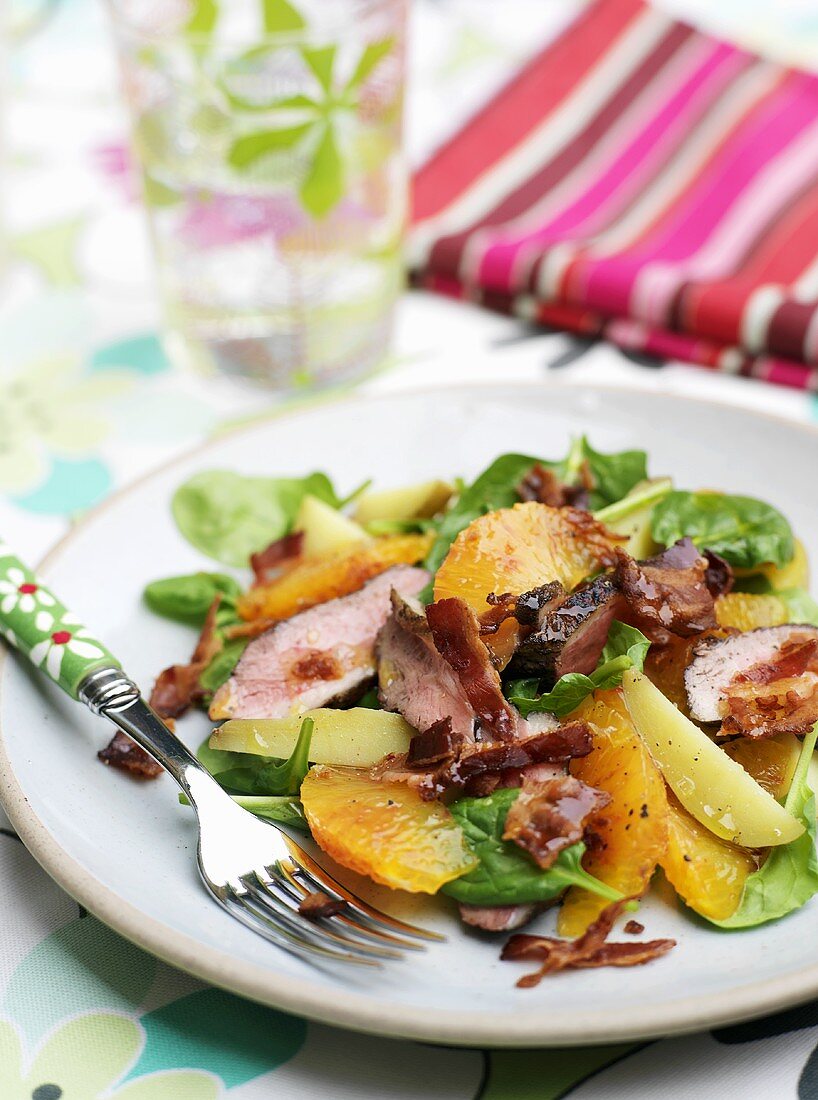 Spinach and orange salad with duck breast