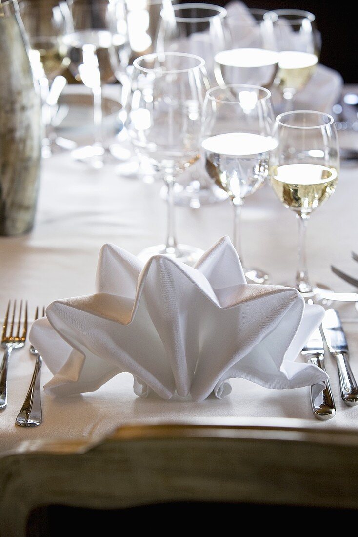 Folded fabric napkin on elegant table