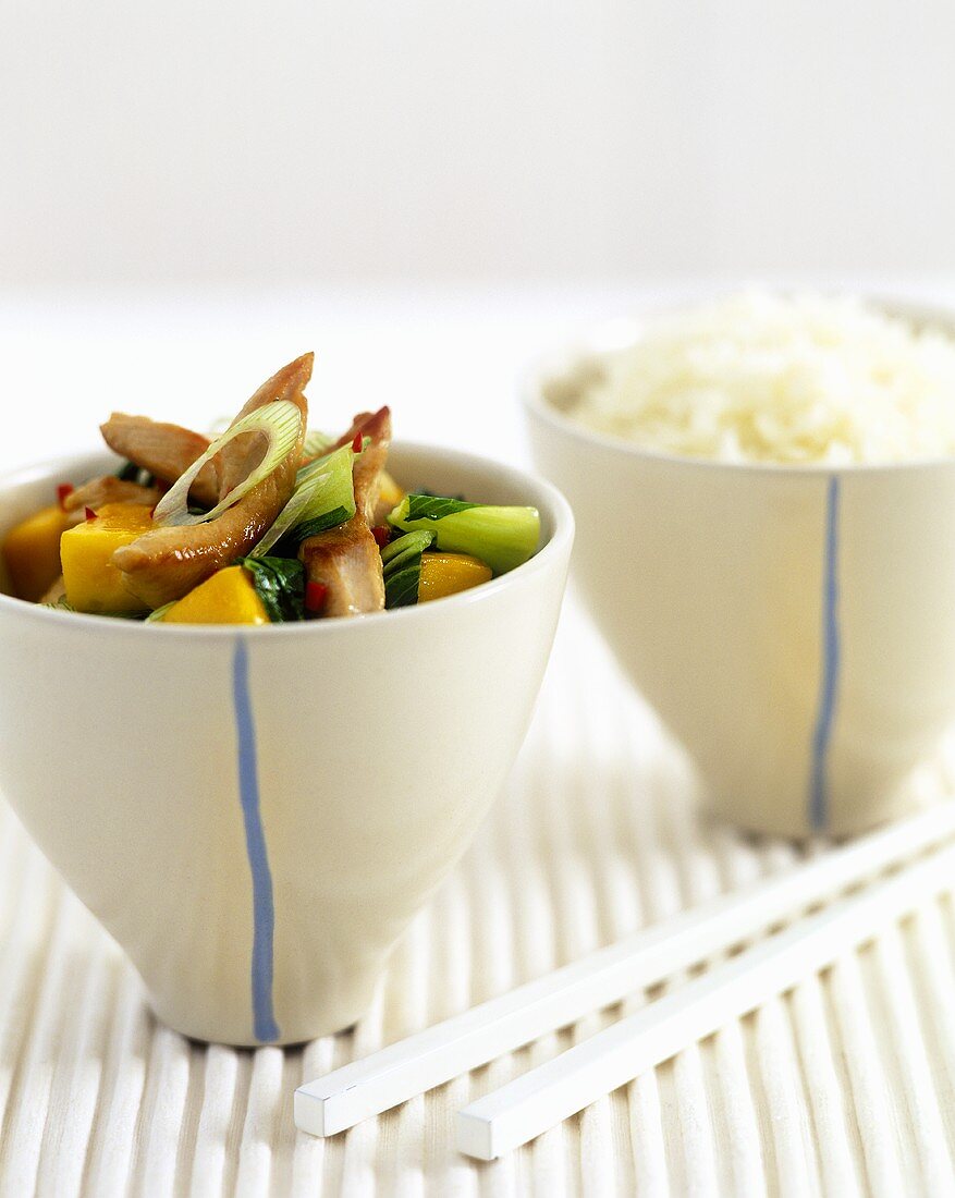 Chicken with pak choi, rice (Asia)