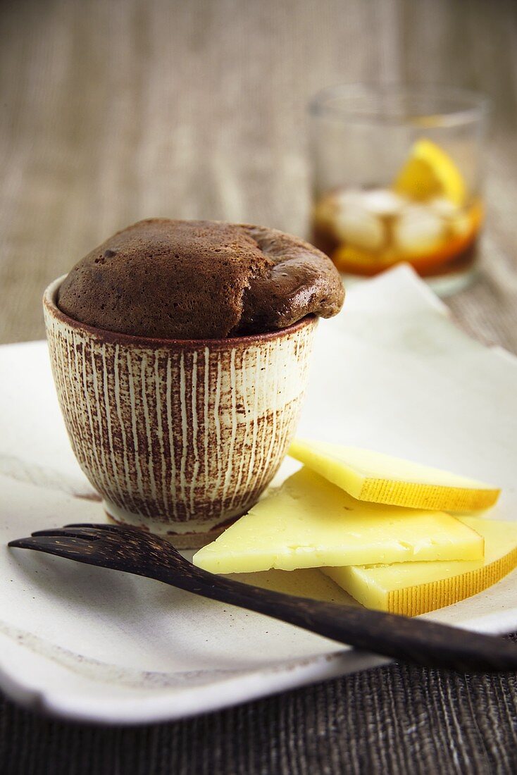 Chocolate soufflé with slices of cheese