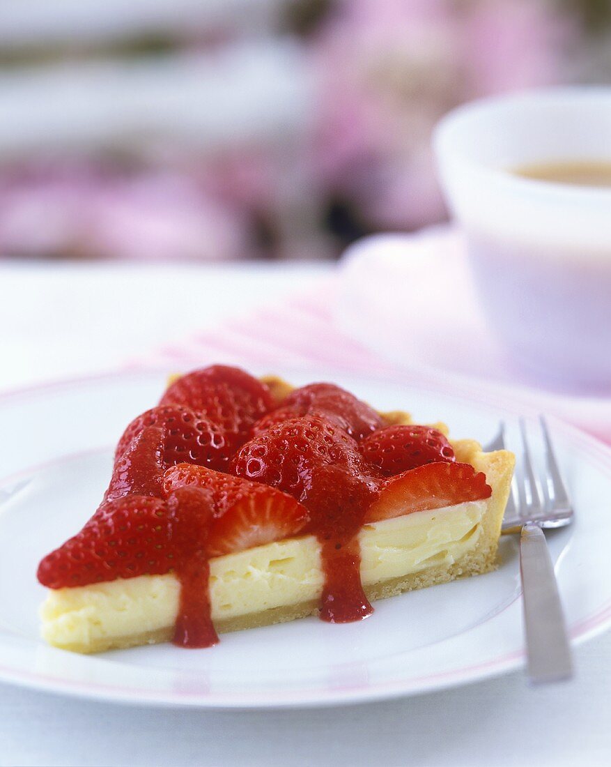 Piece of white chocolate tart with strawberries