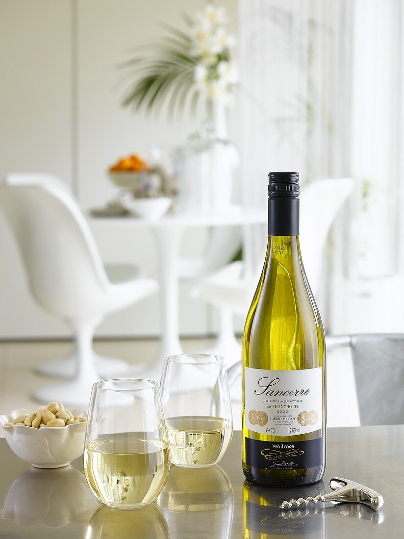 White Sancerre wine in bottle and glasses