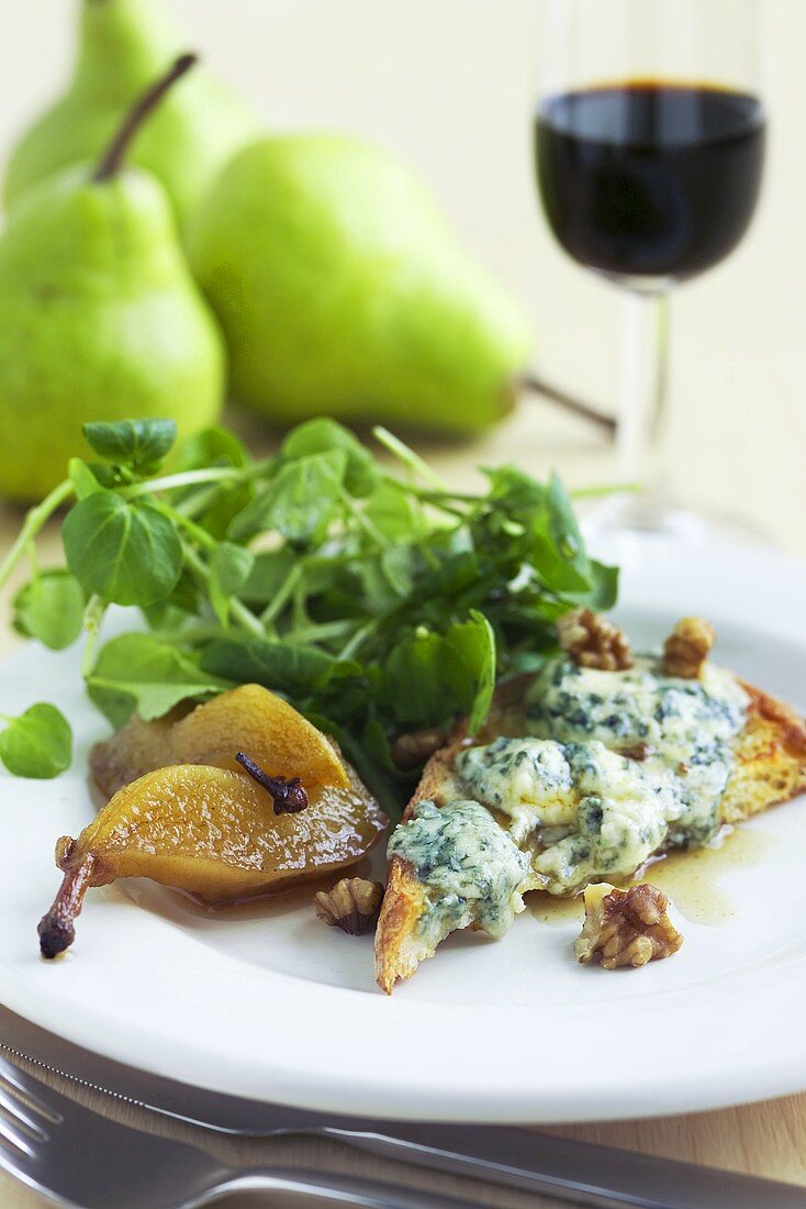 Blue cheese on toast with poached pears and watercress