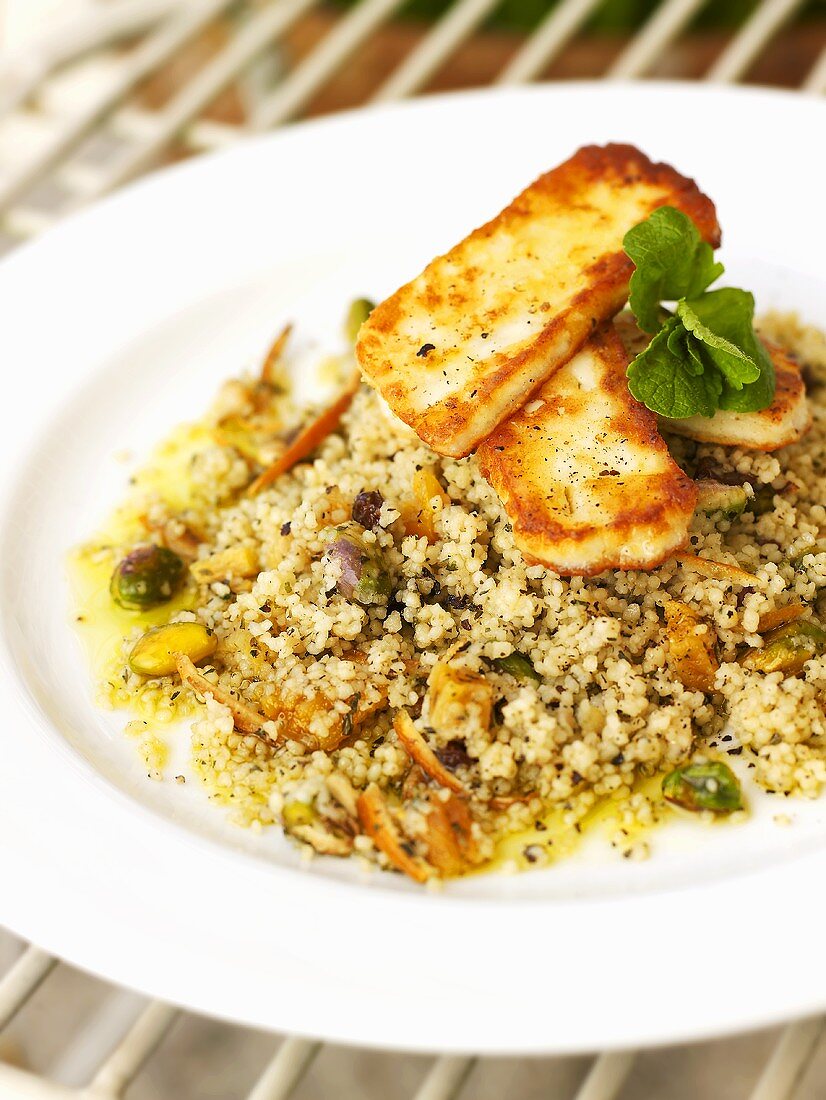 Millet risotto with orange and fried Haloumi