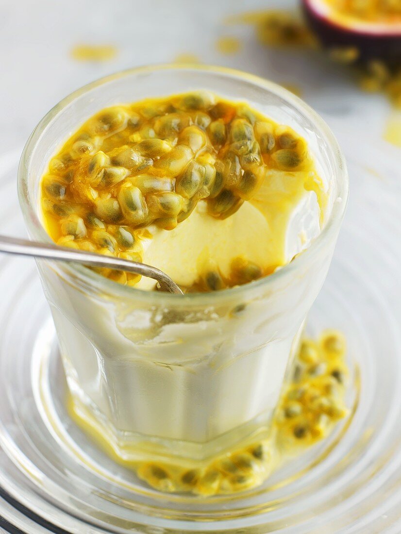 Panna cotta with passion fruit in glass