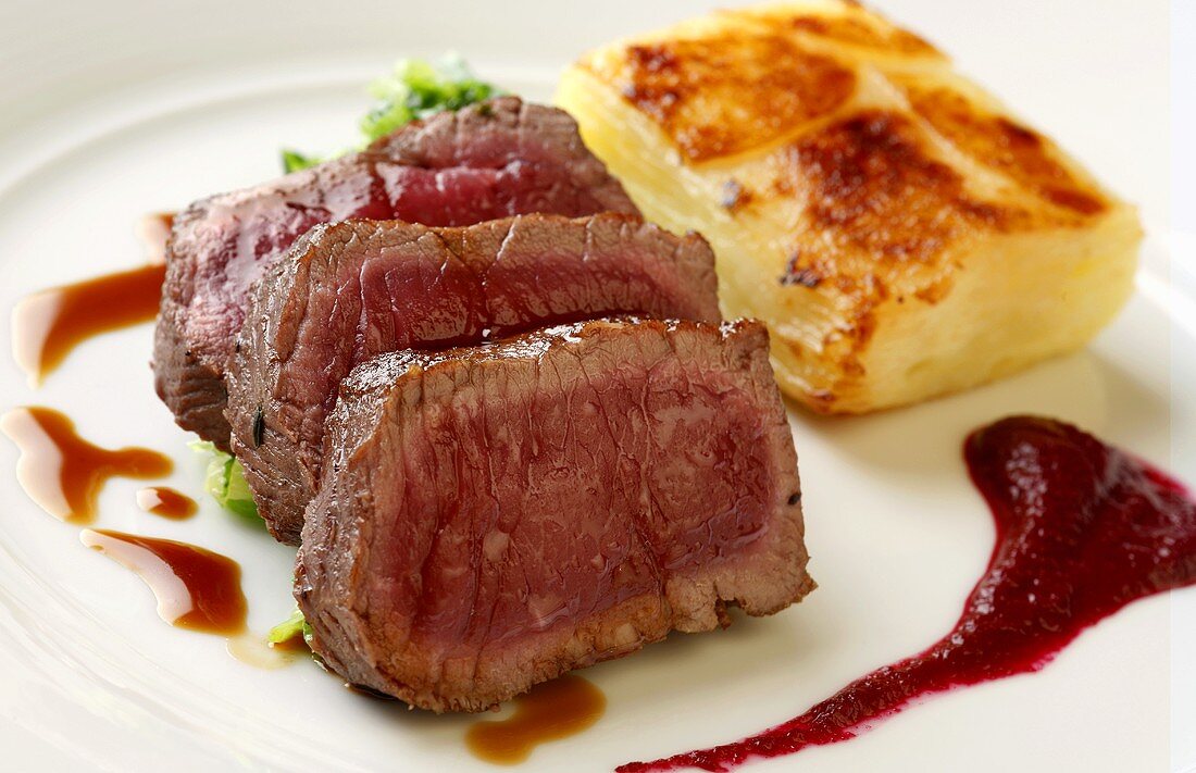 Venison fillet with beetroot sauce and potato gratin