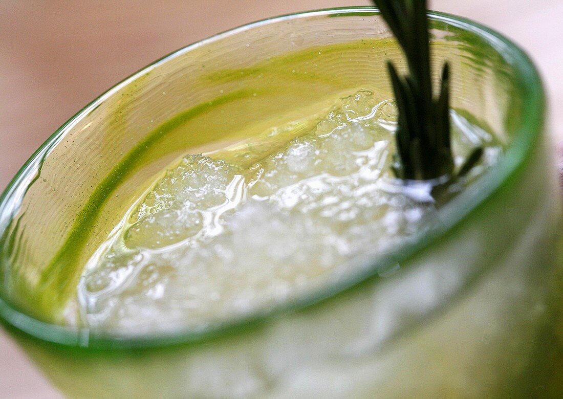 Apple juice with rosemary and crushed ice