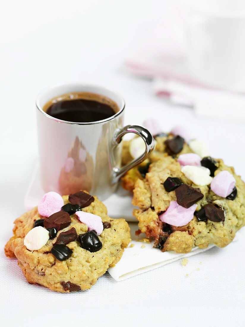 Chocolate chip and marshmallow cookies with coffee
