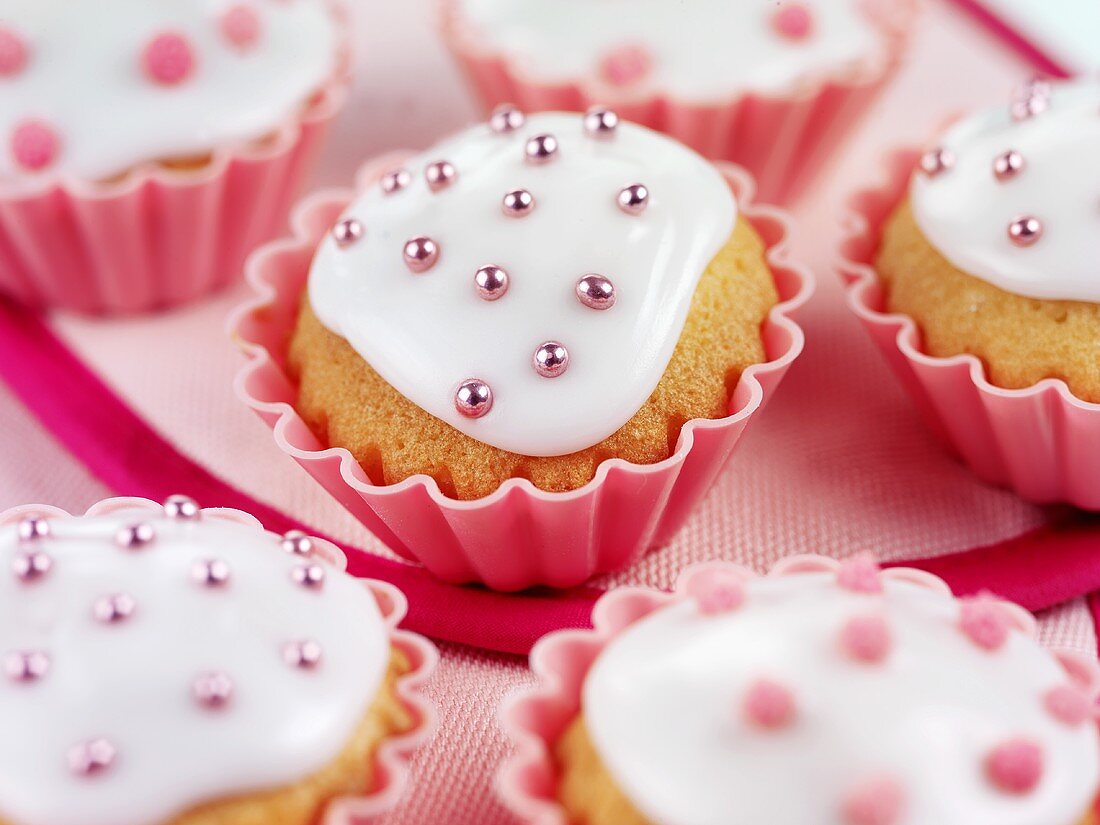 Fairy cakes with pink sugar pearls