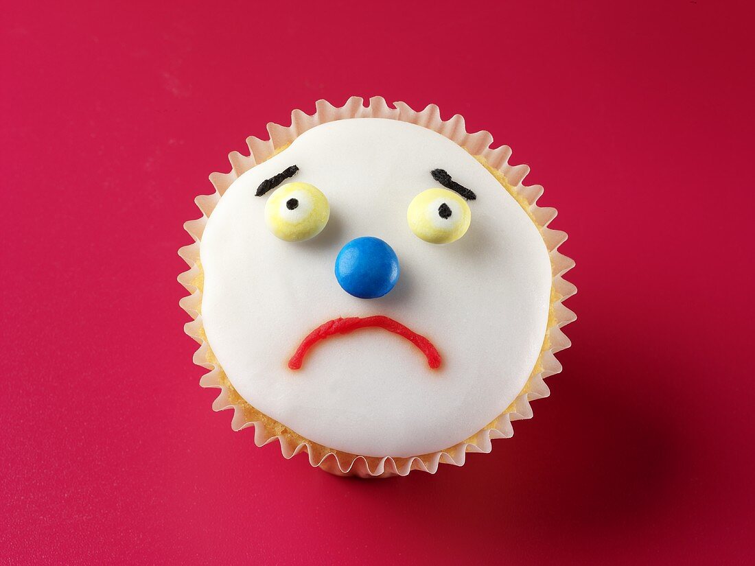 Cupcake with a sad face