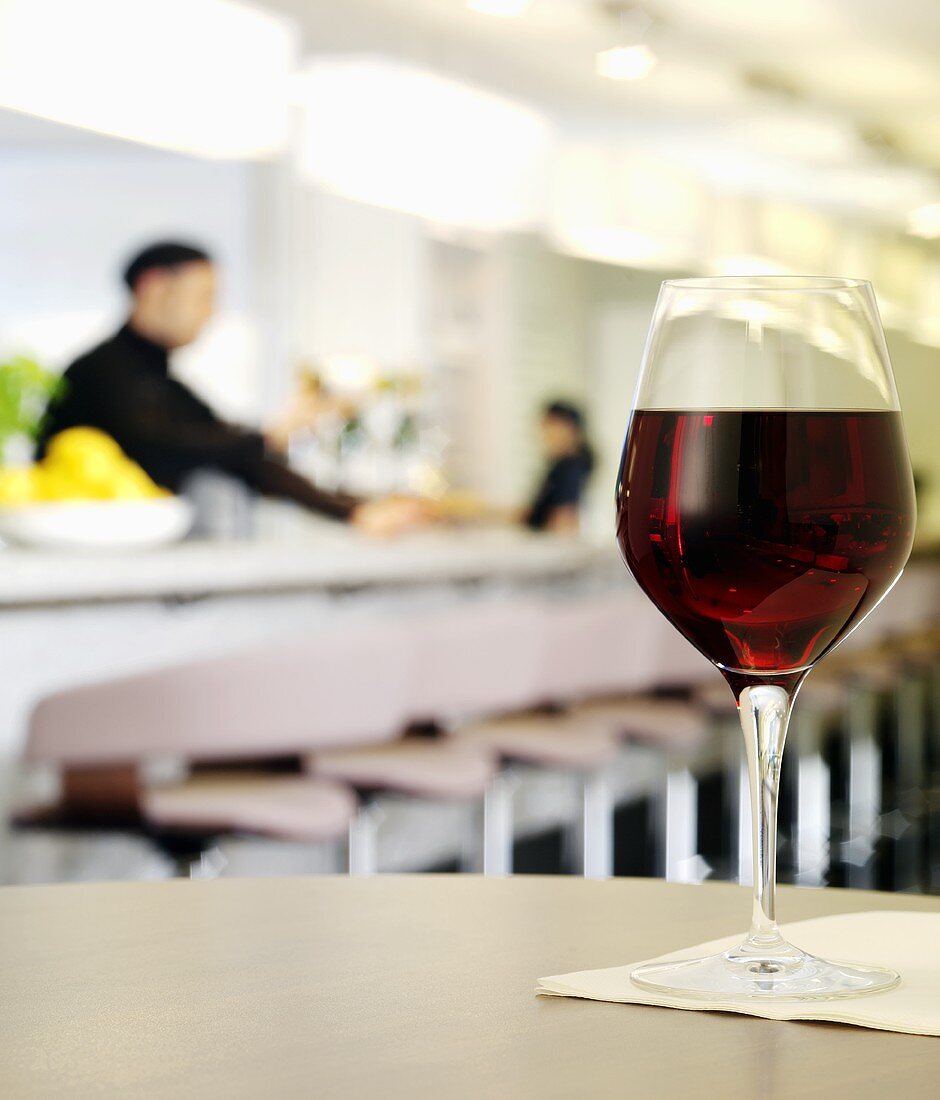 A glass of red wine in a restaurant