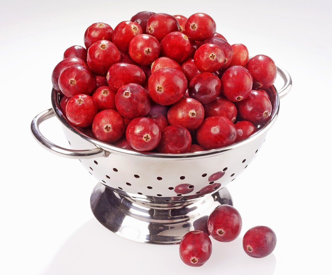Lots of cranberries in a colander