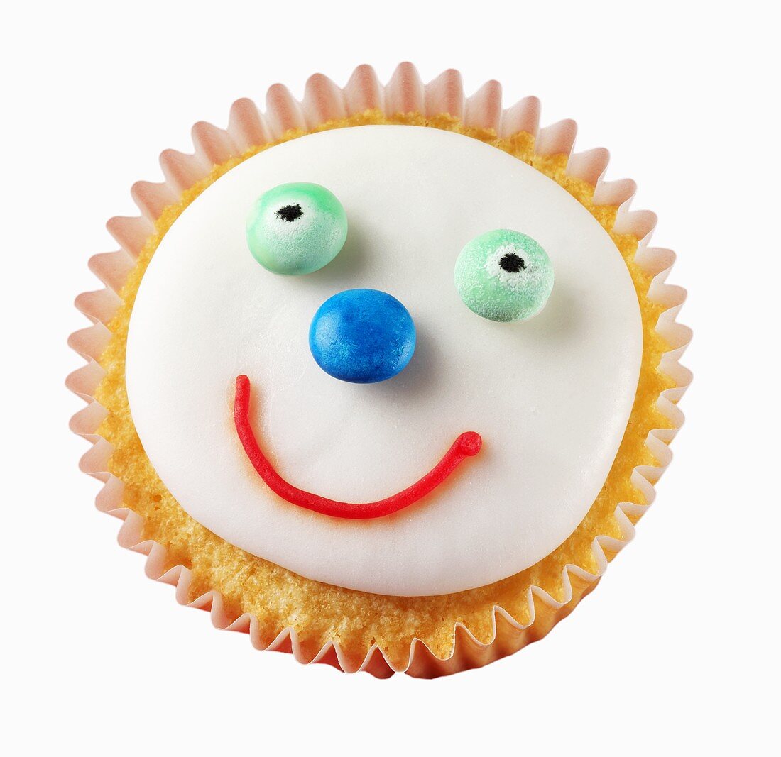 Cupcake mit lustigem Gesicht