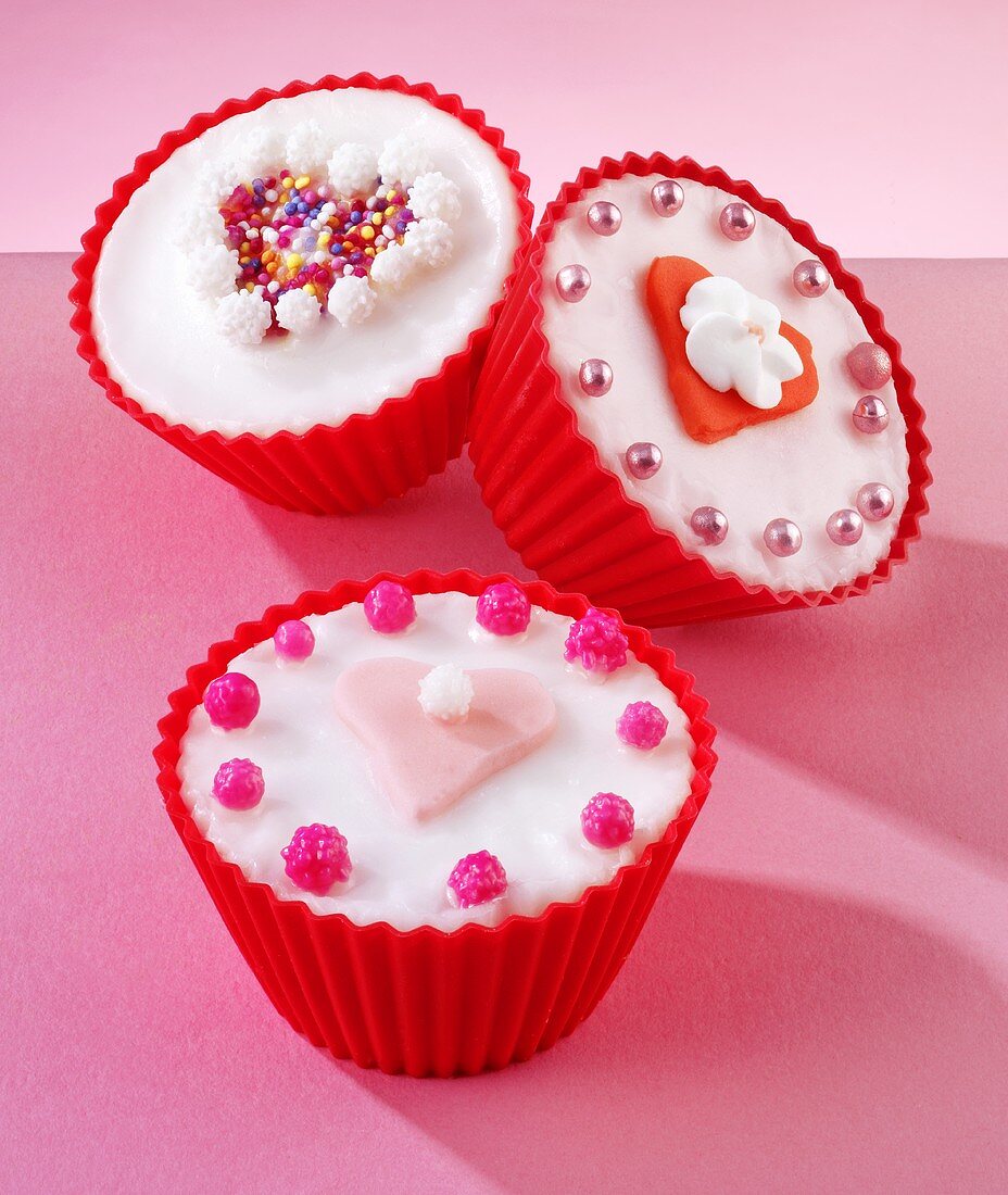 Fairy cakes with heart-shaped decorations