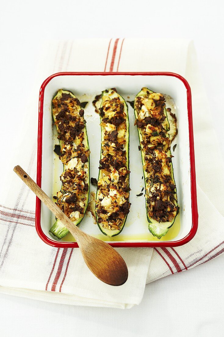 Stuffed, baked courgettes with minced meat and feta