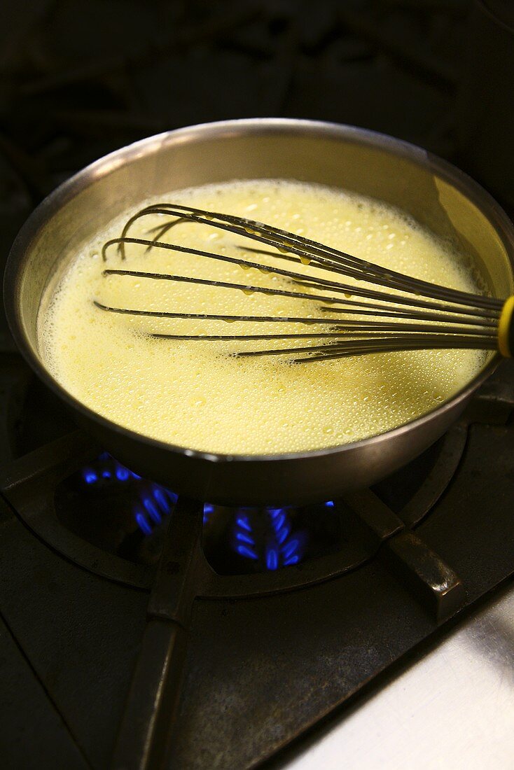 Vanilla sauce in a pot on the hob